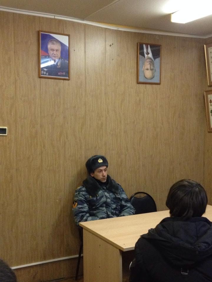 Held at a police precinct after a protest, with Boris Nemtsov and Ilya Yashin — a year before Nemtsov's assassination.